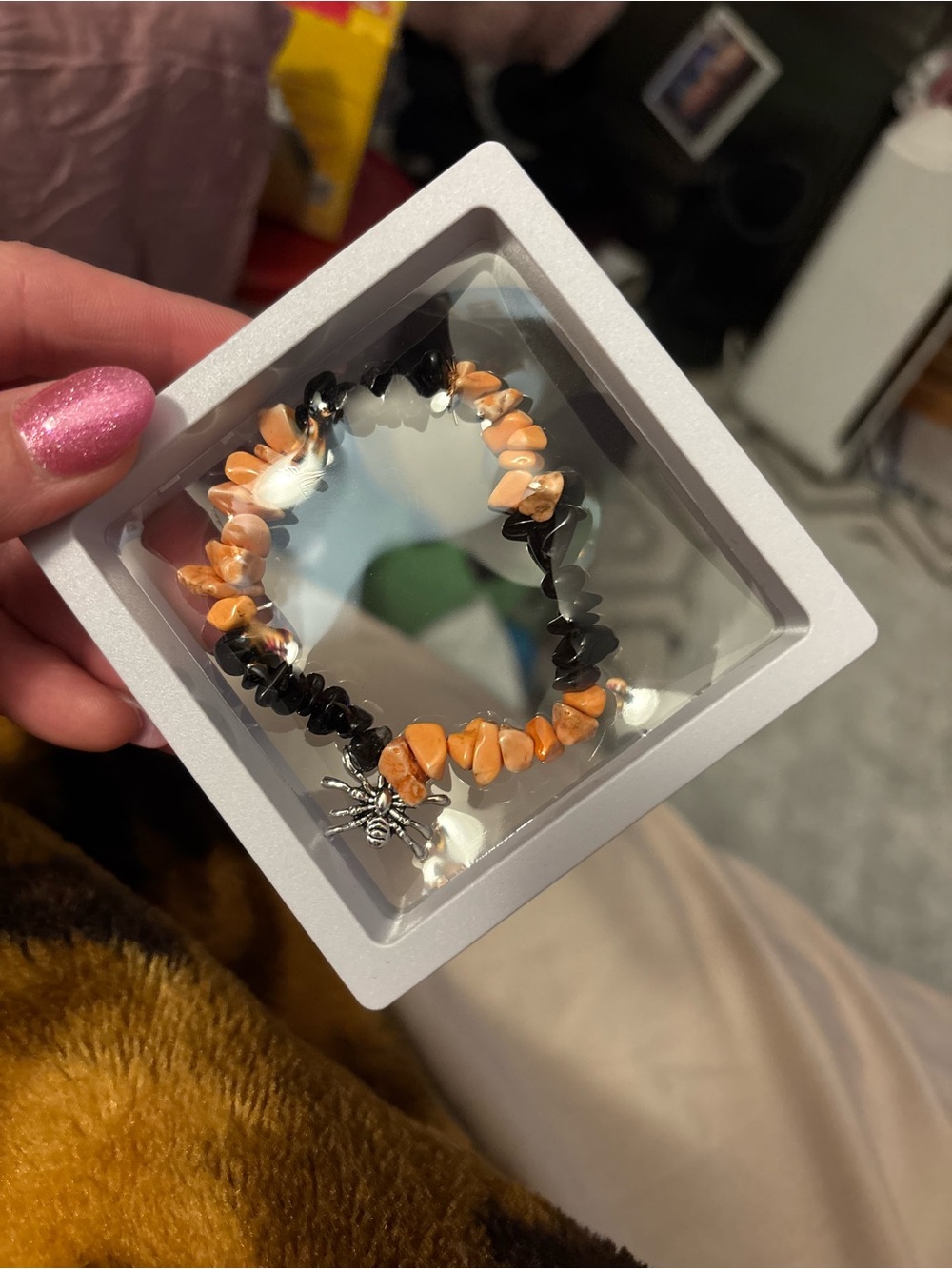 Black and Orange Beaded Stretch Bracelet with Spider Charm handmade by me.